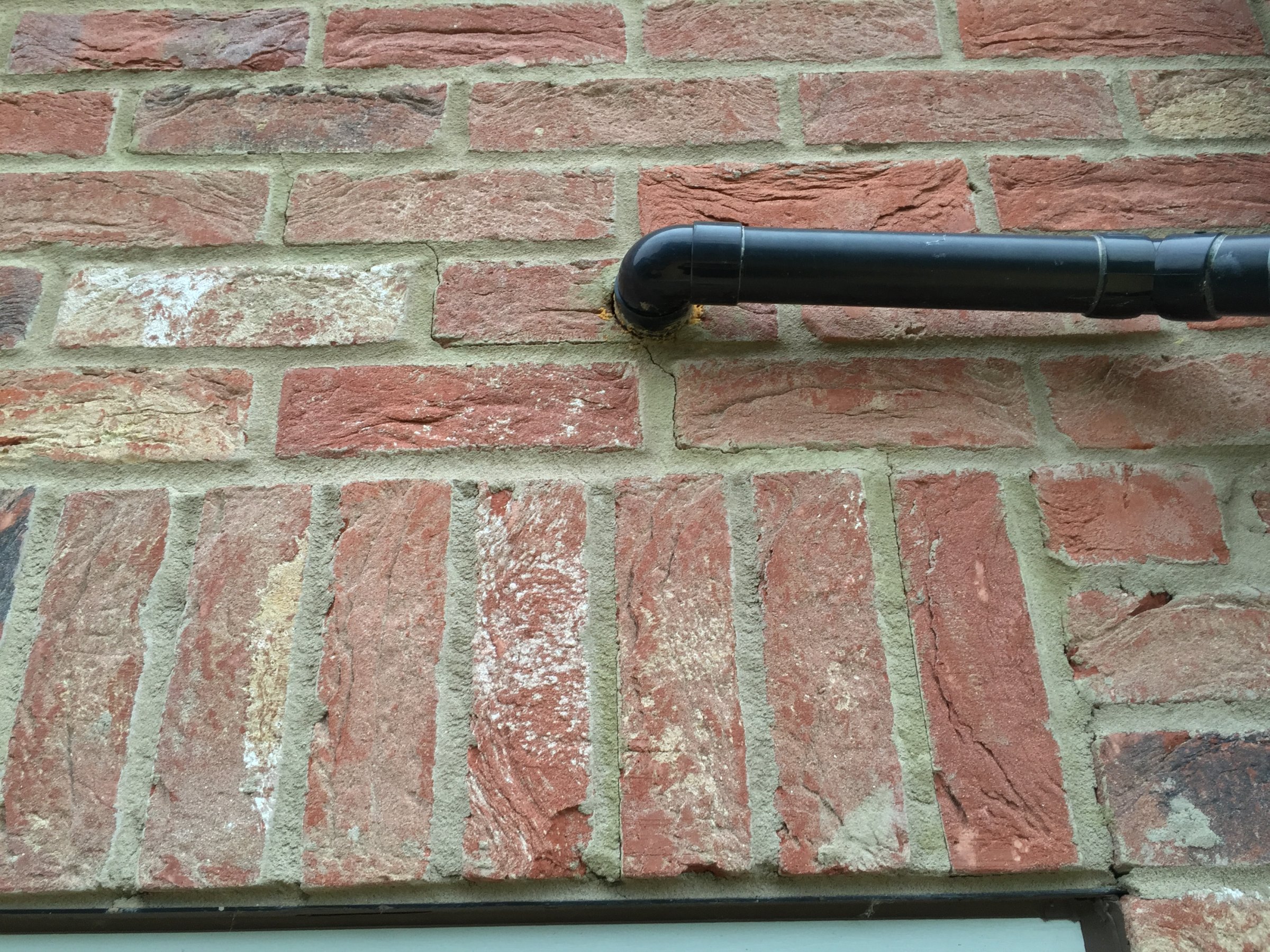 Crack in mortar above door