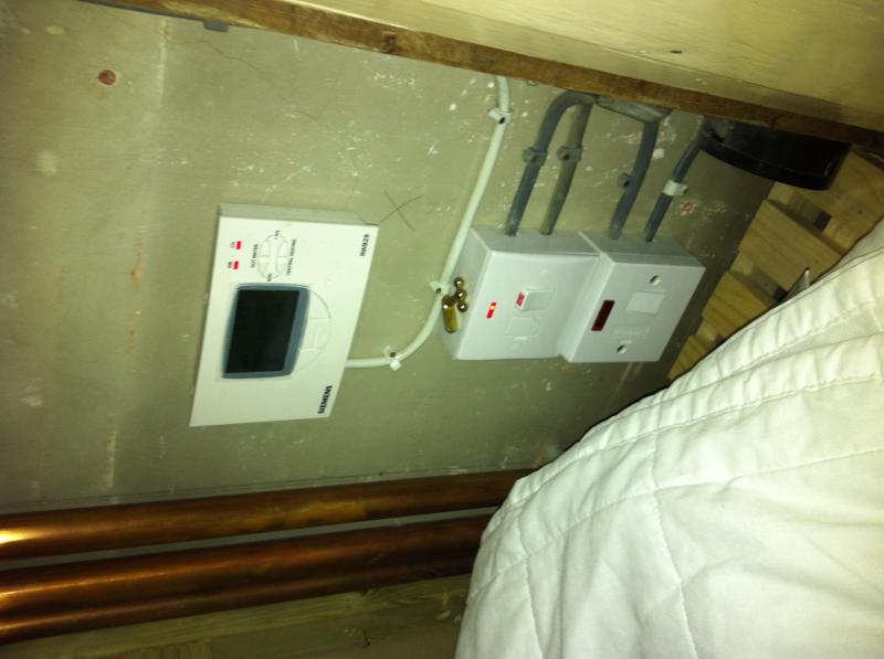 Programme and switches in airing cupboard