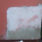 Masonry Paint Blistering on Render – Strip Back or Paint Over?