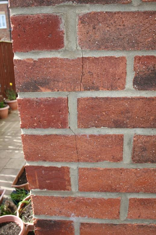 Vertical cracks on external brick wall corner