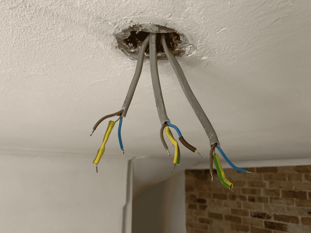 Three cables at a ceiling rose showing the wiring situation