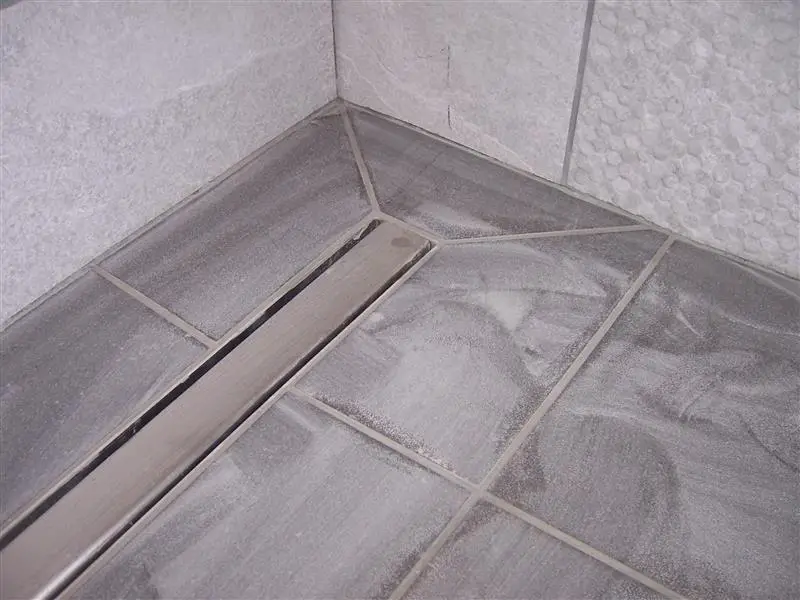 Here's a cheap but very effective method of cutting large tiles for e.g