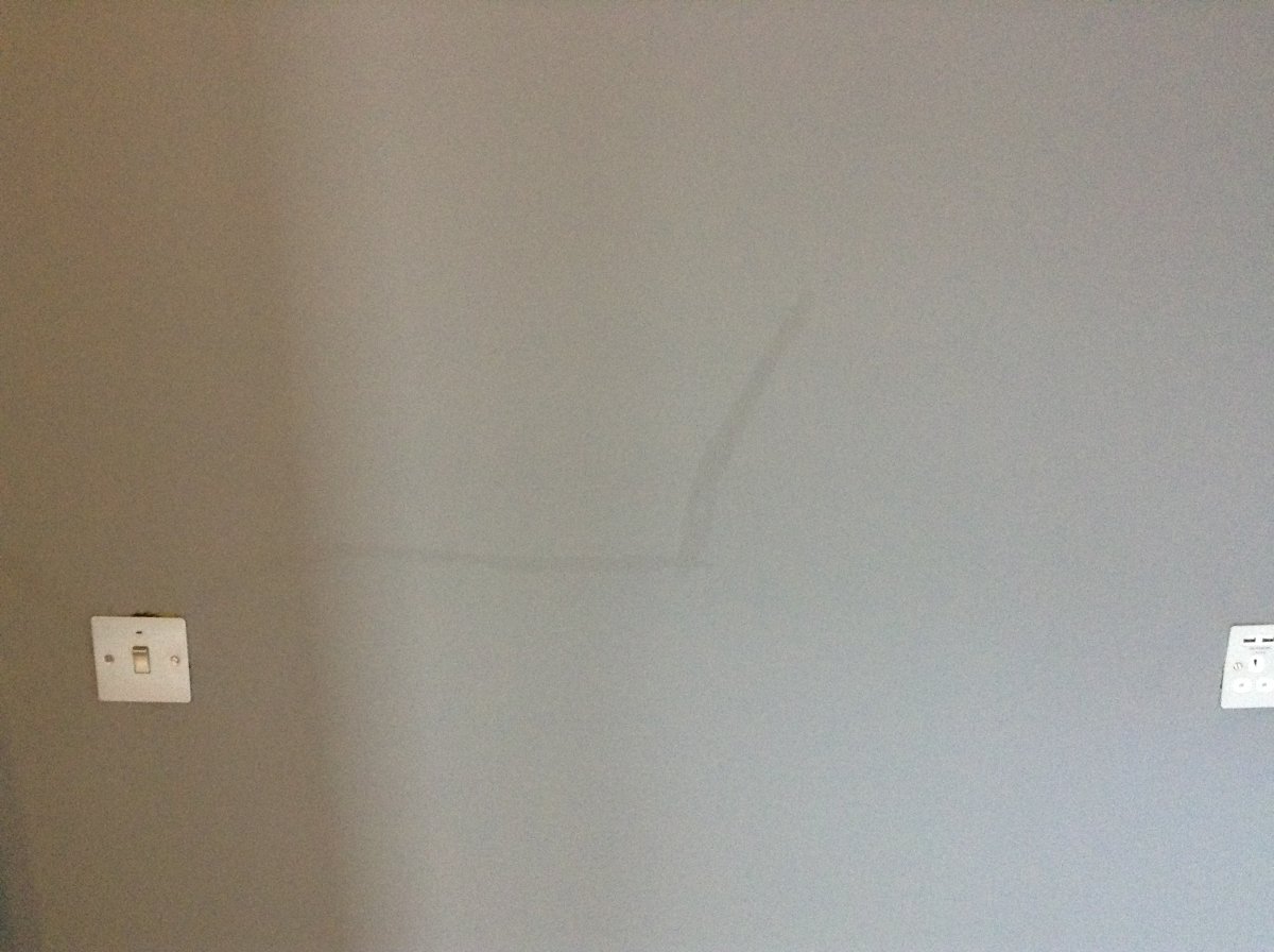 Removing 'stain' caused by caulk on newly painted wall. DIYnot Forums