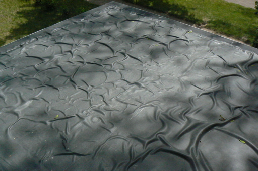 Is it acceptable for a rubber roof to have ripples? | DIYnot Forums