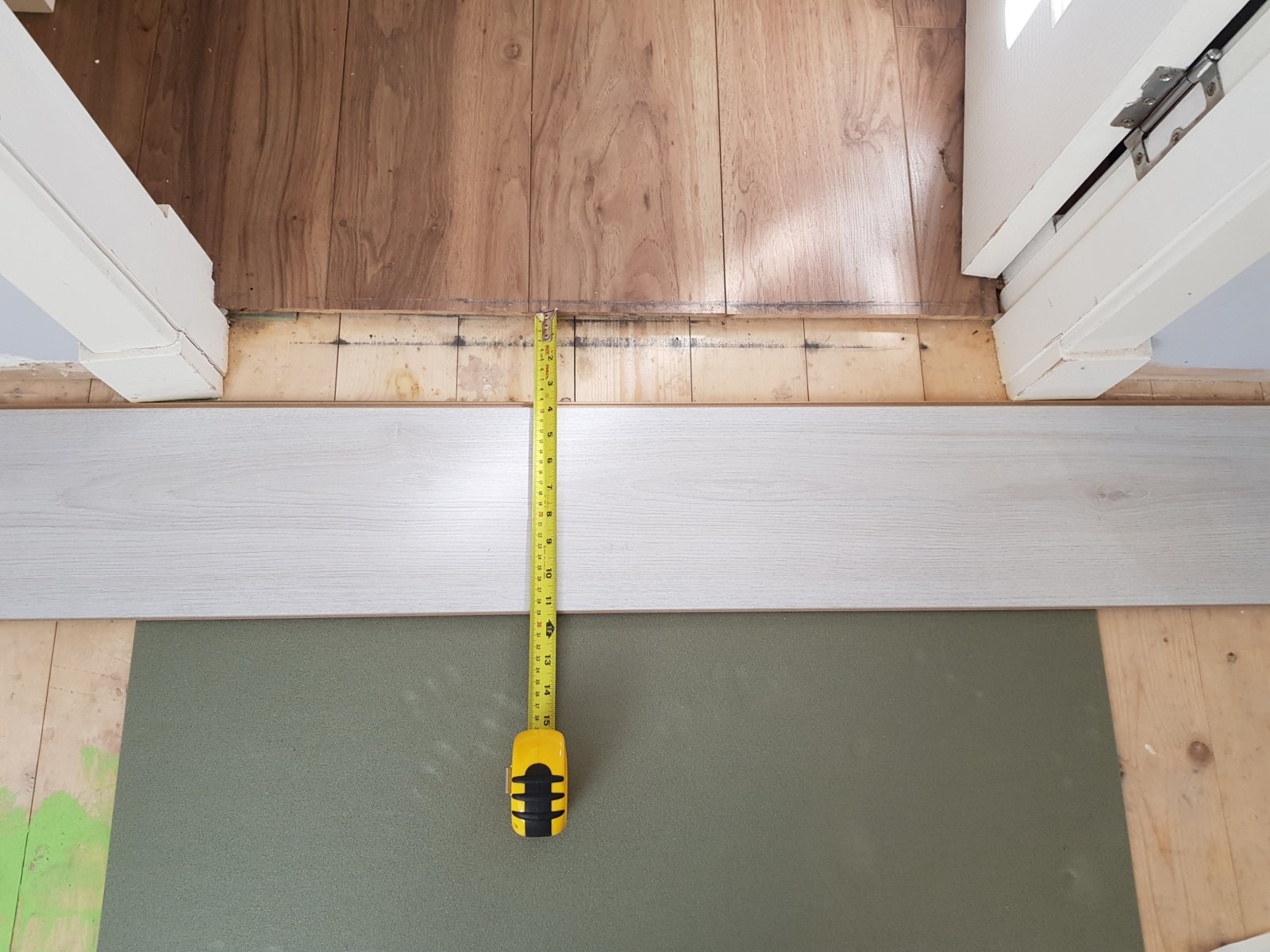 Laminate floor door threshold gap.  DIYnot Forums