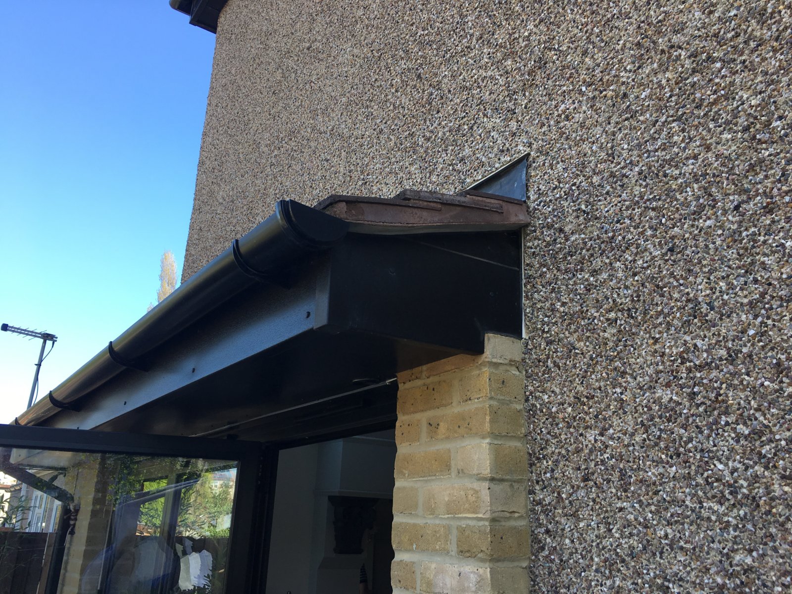 How to create a 300mm overhang on a lean to tiled porch roof DIYnot