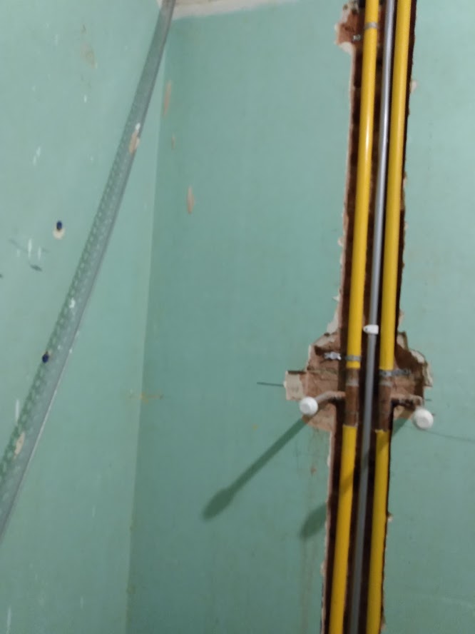 Shower Dilemma pipes in way? Can I fit a Shower Tower