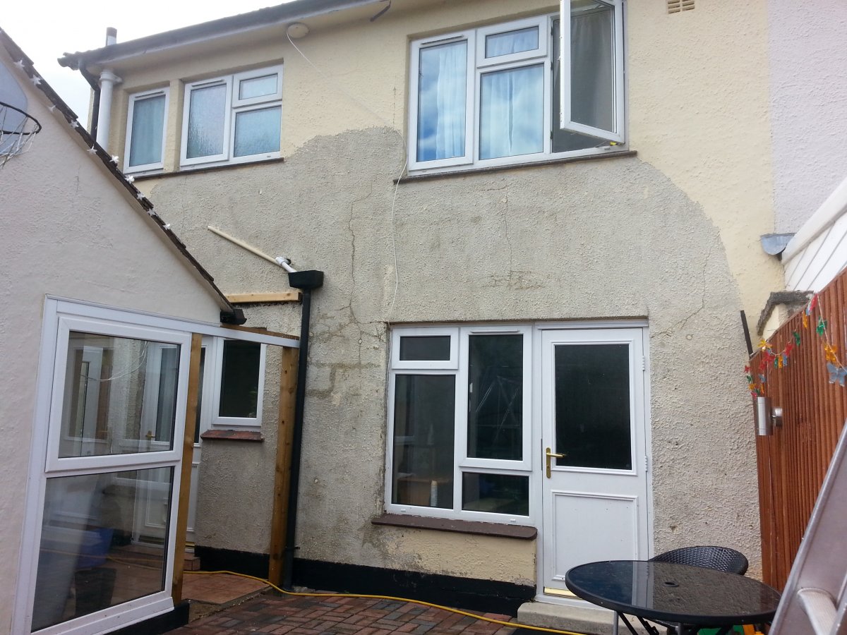 Painting exterior rendered walls after removing old paint