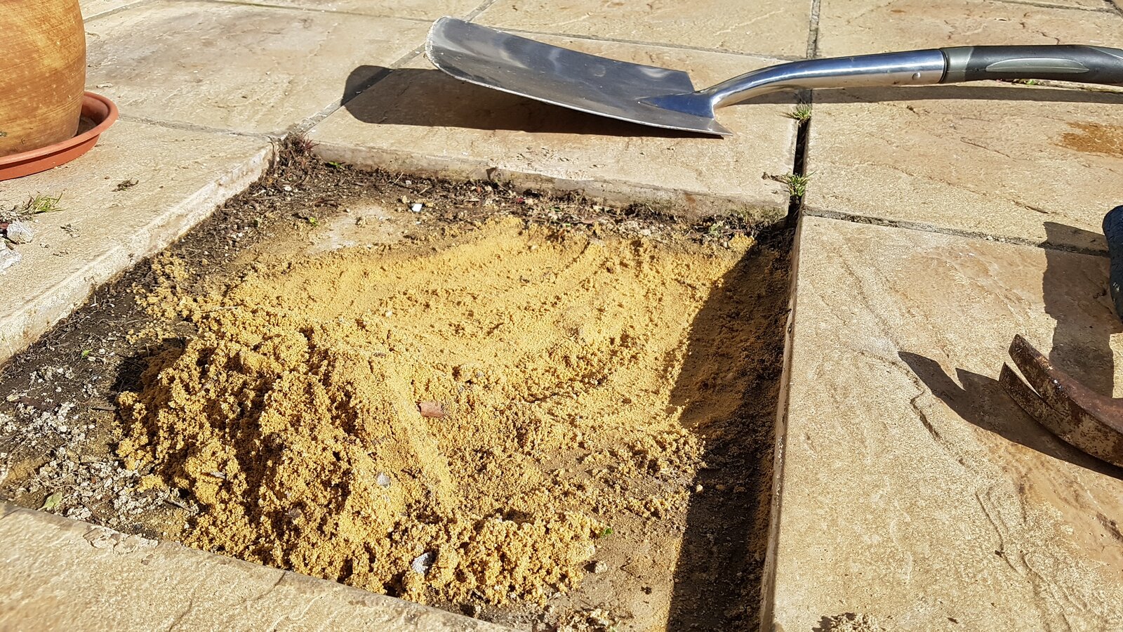 Refixing loose patio slab DIYnot Forums