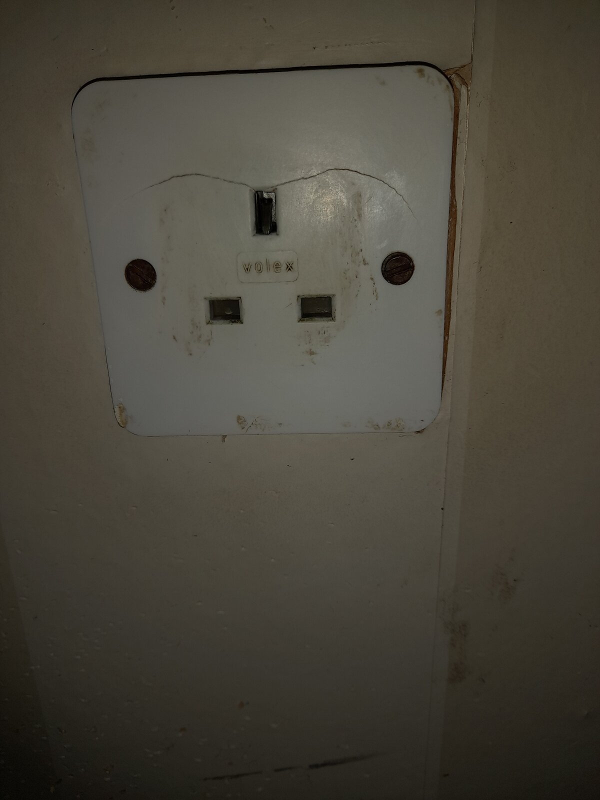 A cracked plug socket which I use a lot for fanheater. DIYnot Forums