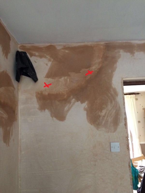 Marks on plastered wall (water wont darken) & strange paint coverage