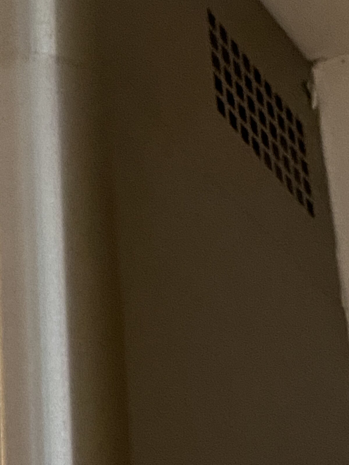 How do I access the motor/fan on a Cooke and Lewis extractor fan