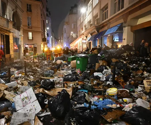a-street-in-paris-after-weeks-of-garbage-collector-strikes-v0-16rkh65n3qpa1.png