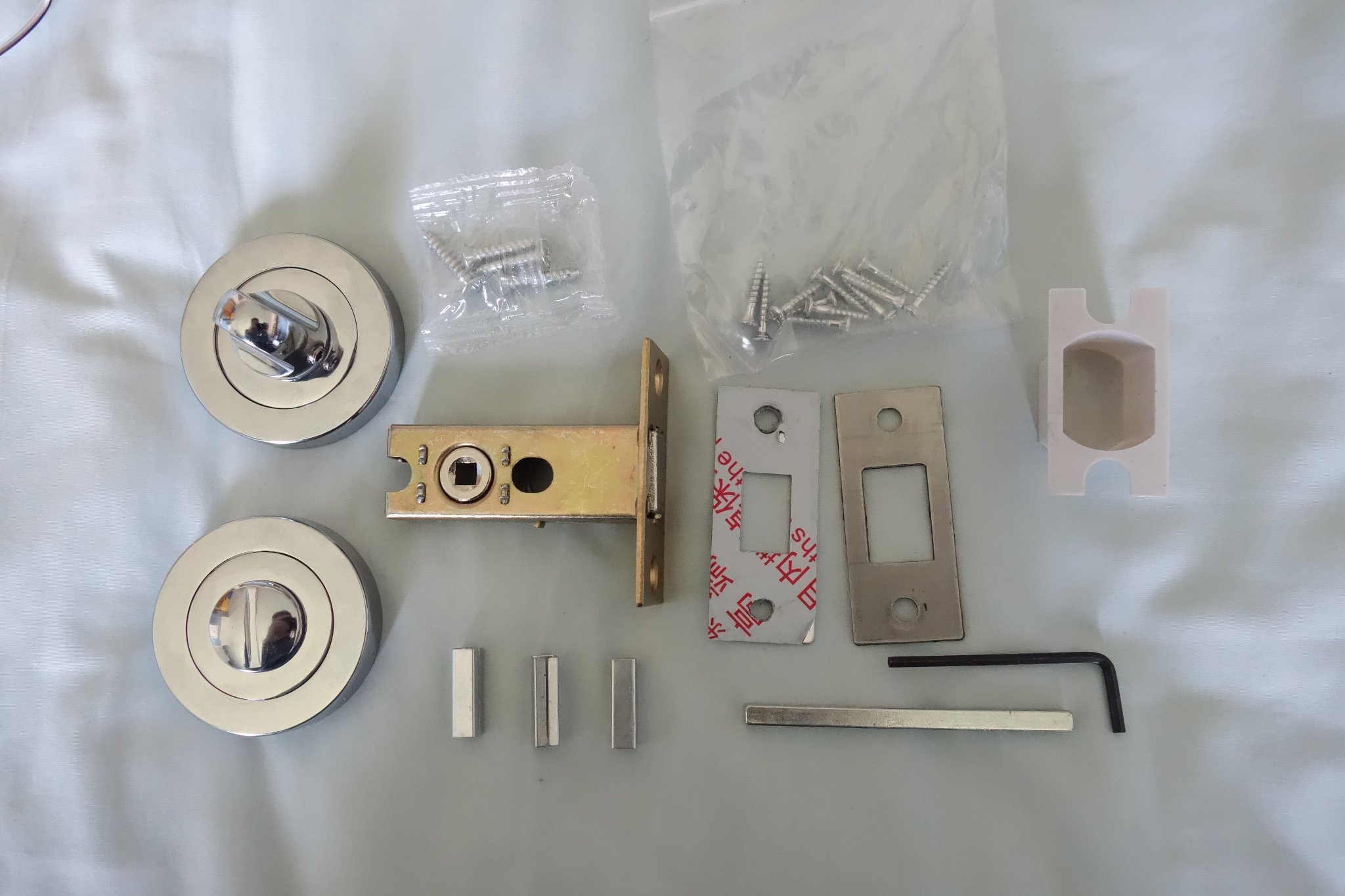 Bathroom lock parts.JPG