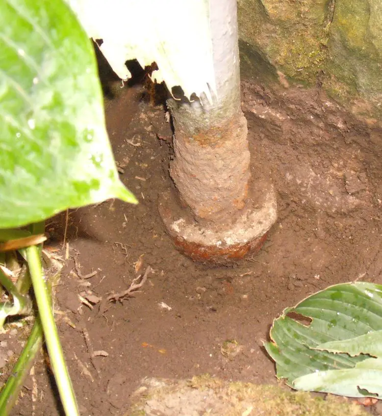 Downpipe with sleeve and connection to vitrified clay pipe socket.JPG