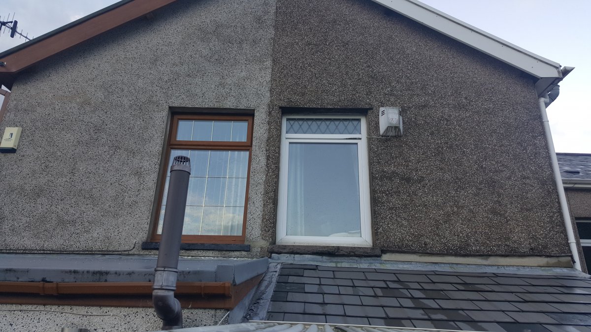 argument with neighbor regarding rendering on our terraced wall | DIYnot  Forums