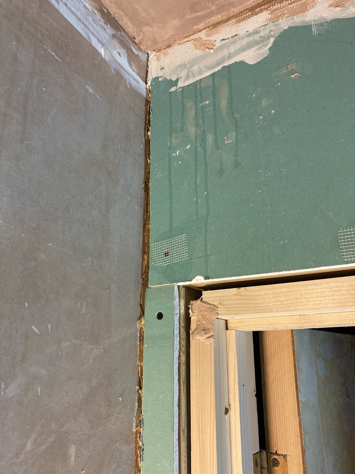 How to deal with gaps between plasterboard and adjacent finished wall
