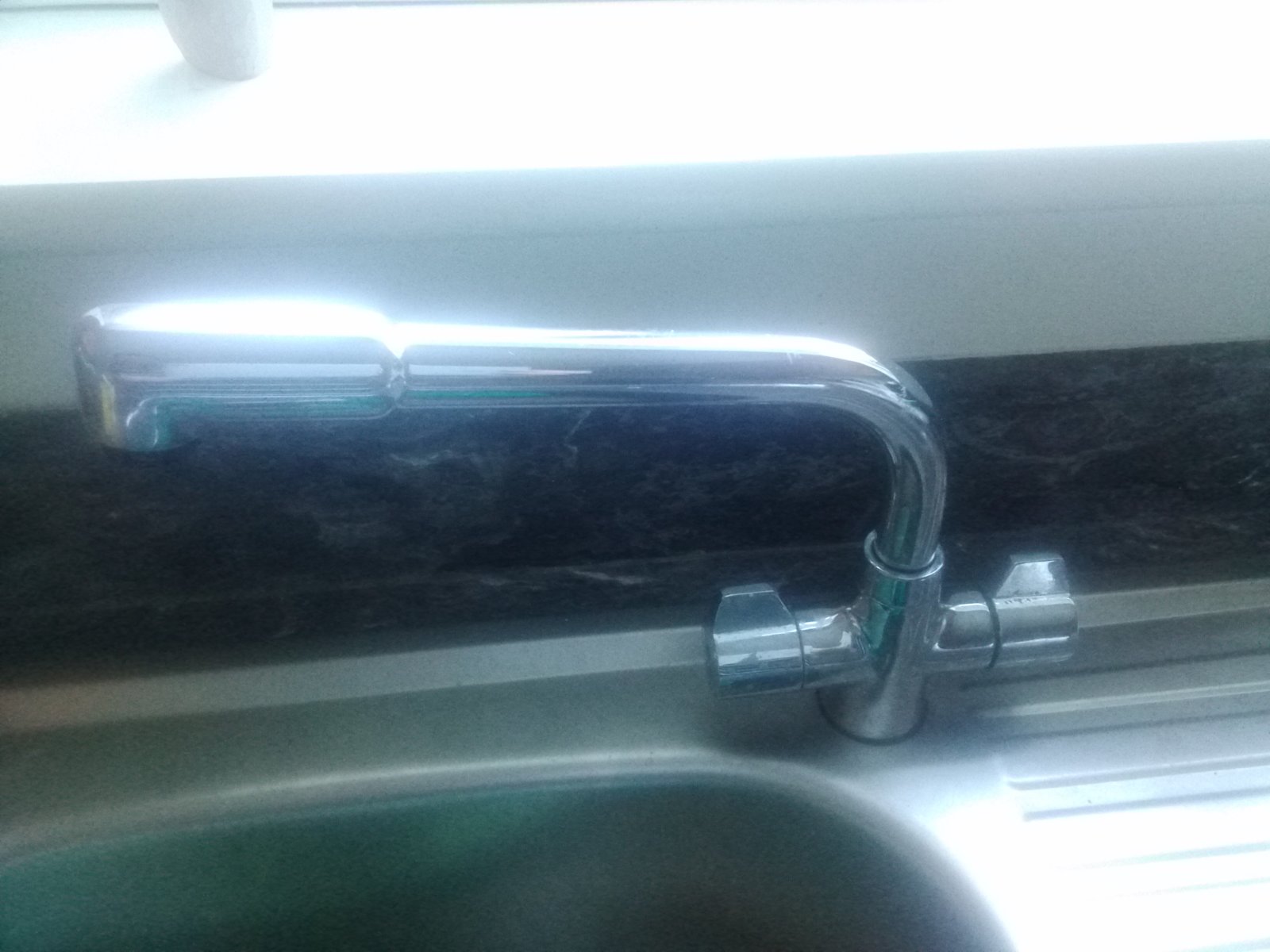 Kitchen mixer tap squeals and leaks when other taps get used. DIYnot
