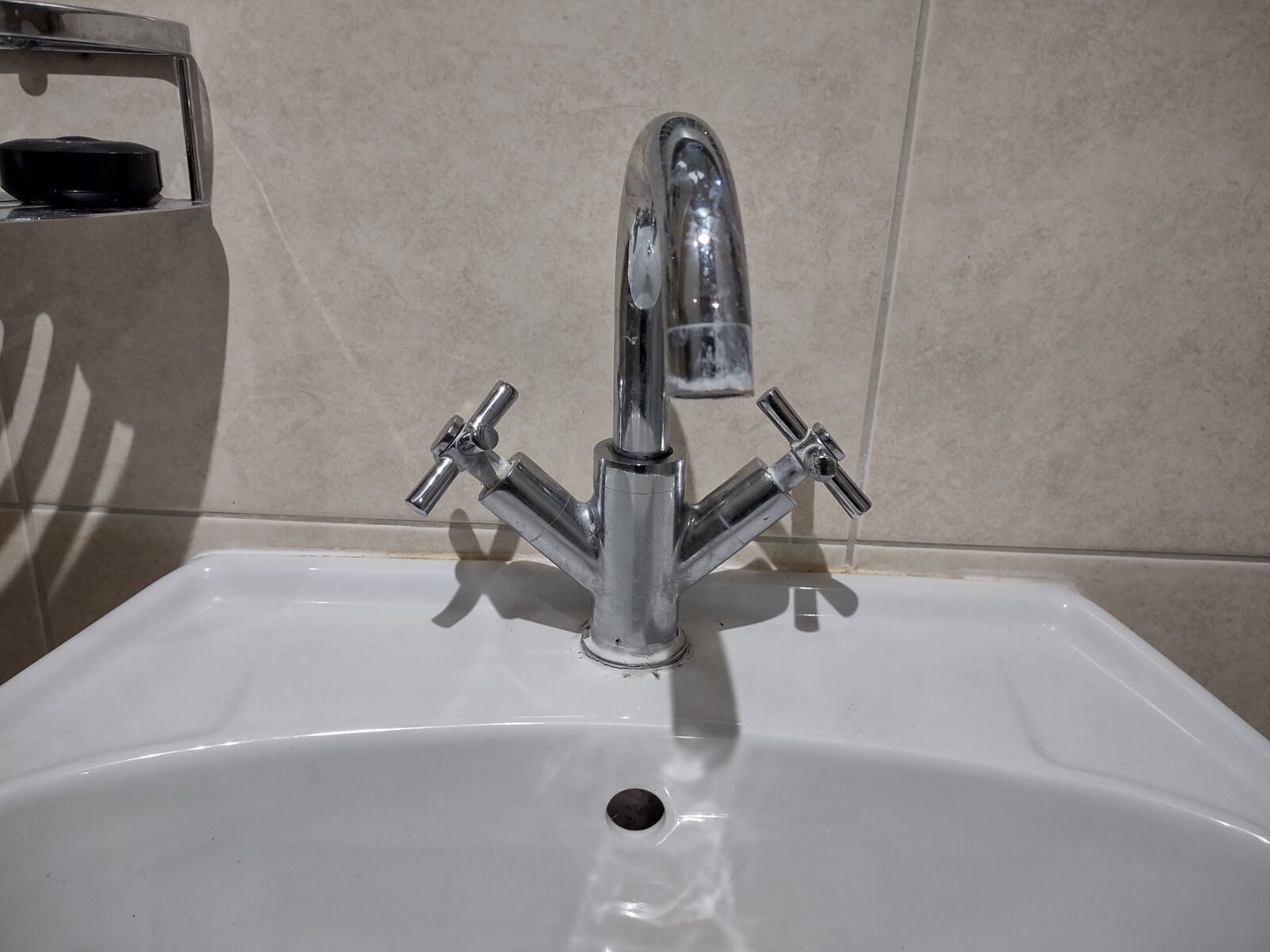 A couple of wash basin issues removing a back nut from a tap and a