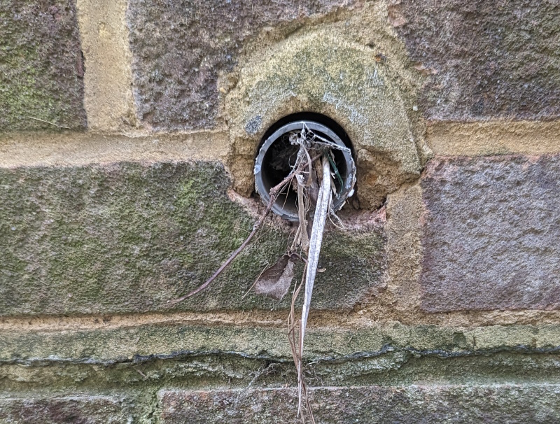Fixing gaps around pipes in outside brick wall DIYnot Forums