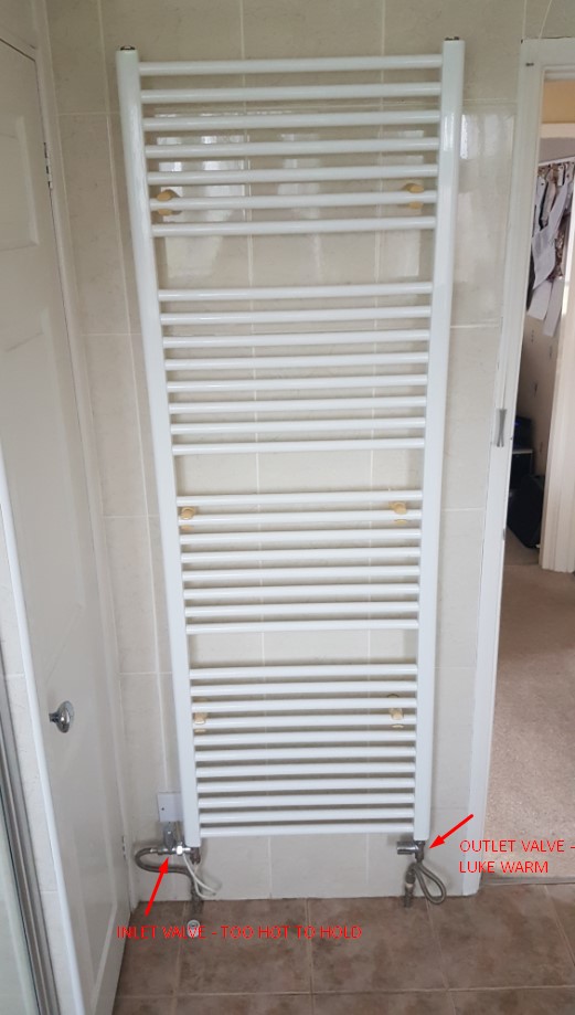 Bathroom Towel Radiator only gets luke warm but inlet pipe is VERY hot