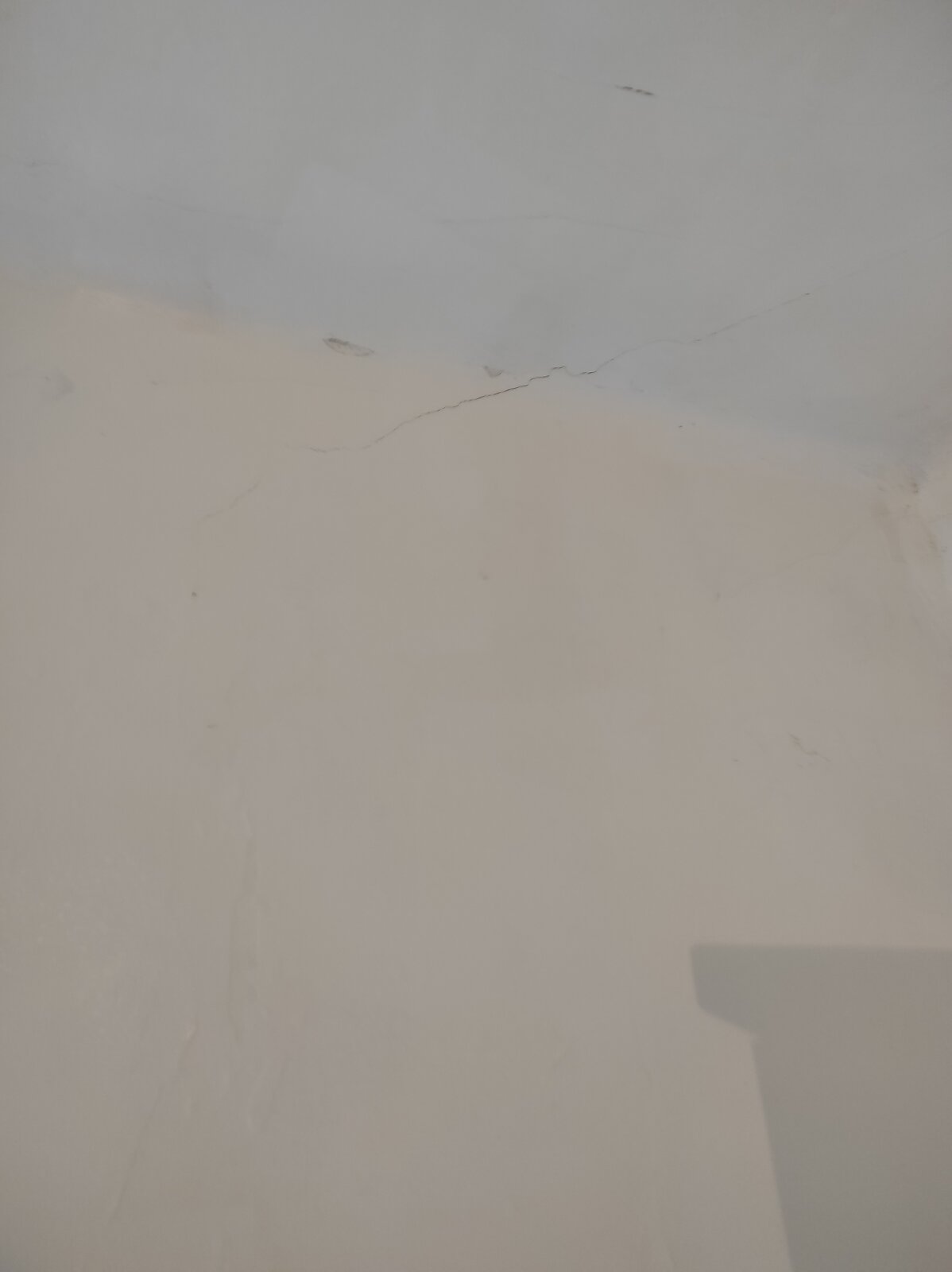 WallAndCeilingCracksLivingRoom.jpg
