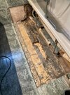 Bathroom floor before replacement floorboards.jpg