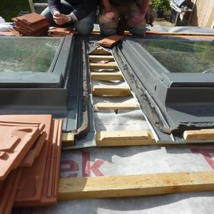 leaking 15 degree pitch roof with velux windows