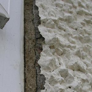 Rendering damage around uPVC windows