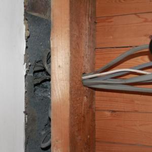 Hole in the wall for electrical cables