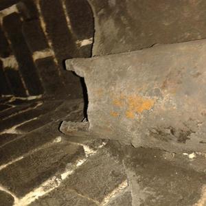 ceramic pipe behind fireback?