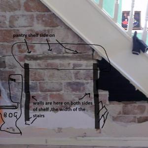 stairway pantry shelf