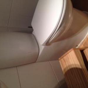 toilet with hidden pipe