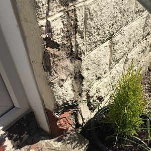 External Render/Brick Work...best way to fix?