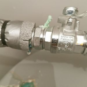 Water leaking from pipe above boiler