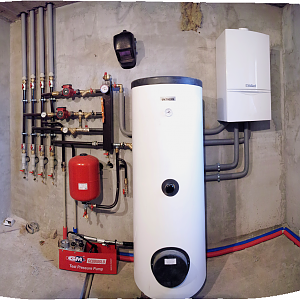The tankless Gas Boiler and 200l hot water celinder.