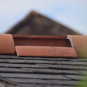 Broken roof tile