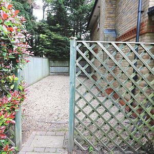 Space between fence and external wall