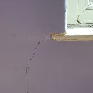 hairline crack bottom corner
