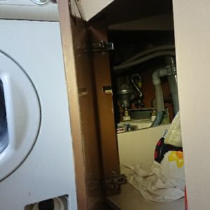 Washing machine with waste pipe