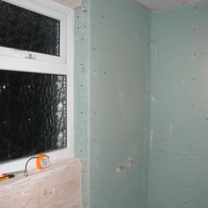 Stud wall to house shower pipes