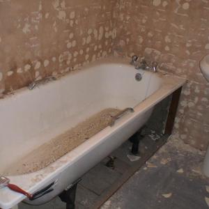 Taking the tiles and bath out