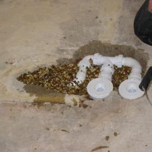 Shingle backfill to waste traps & pipe