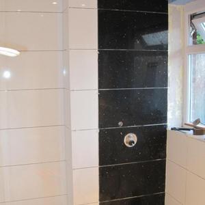 Fitting tiles over shower mixer