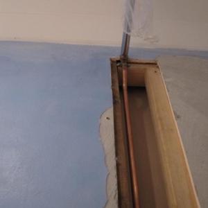 Cutting out the stud wall for main shower head