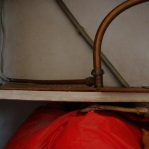 top of cylinder with vent to loft