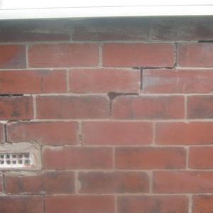 UNDER BACK LIVING ROOM WINDOW