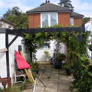 REAR VIEW WITH UPPER FRENCH DOORS