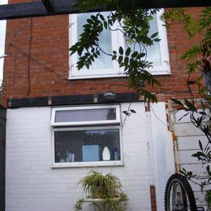 ROOF COMING FROM BELOW STEP ON UPPER FRENCH DOORS