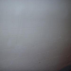 fake tile etched in wall